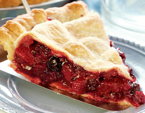 After Thanksgiving, I had lots of leftover cranberries so I decided to use some of them to make a pie. This is the recipe I came up with. It tasted wonderful and my dessert was a big hit. It is delicious alone or served with ice cream or custard.